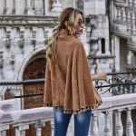 pull poncho à capuche en peluche