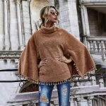 pull poncho en peluche