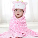 cape de bain bébé motif vache rose