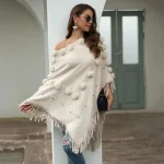 poncho à franges et pompon