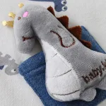 poncho enfant avec motif dinosaure