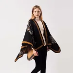 poncho à franges léopard femme