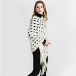 poncho en tricot ajouré