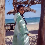 poncho de surf wind