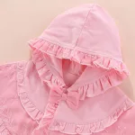 poncho en laine rose pour enfant