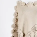 poncho d'hiver avec pompon