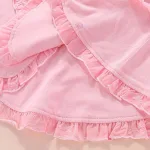 vêtement rose fillette poncho