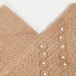 poncho en perles pour un look boho