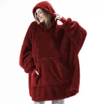 poncho en finition plaid chaleureux