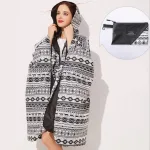 poncho imperméable noir et blanc